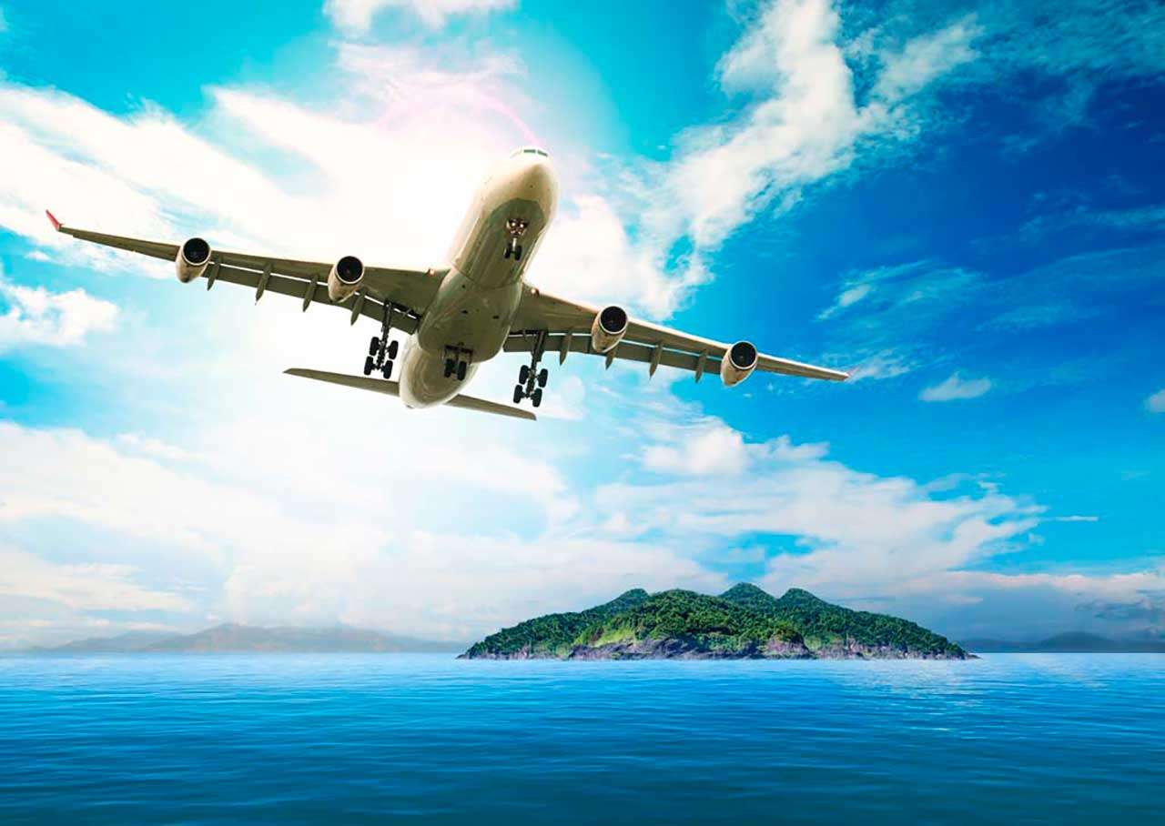 Фотообои в интерьере самолет над морем  9-203 фото