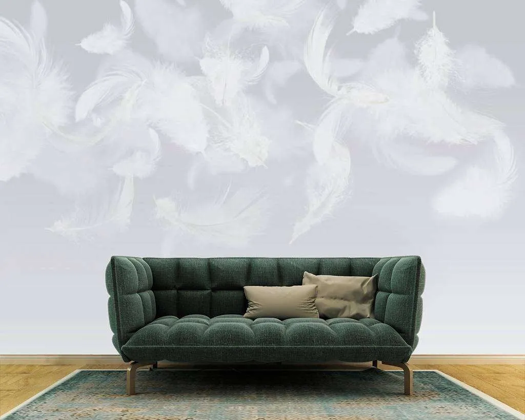 Фотообои в интерьере белые перья на сером фоне  13-057 фото